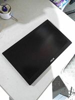 Front view of Asus portable monitor on table
