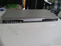 Front view of Hitachi DV-P534U DVD player showing controls and disc tray