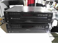 Front view of two stacked JVC 5-disc CD changers