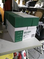 Full view of sealed Willcopy copy paper case on table