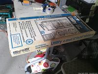 Unopened Hirsh Utility shelving box on table