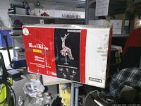 Front of boxed 66" animated LED reindeer decoration showing dimensions and features