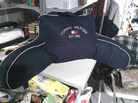 Front view showing logo, color, arms, shape