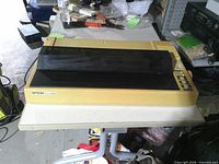 Closed Epson FX-286 printer on table