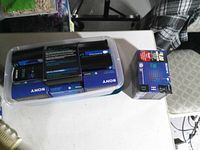 Plastic bin containing multiple sealed Sony floppy disk packs