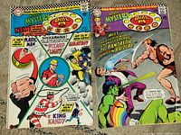 Front covers of both comic issues showing titles, issue numbers, artwork, and condition.
