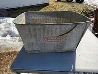 Side view showing Beatty logo and dent