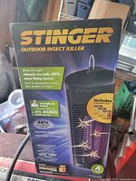 Front of box showing product image, brand name, UV light feature