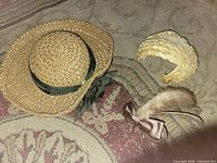 All three headwear items laid out on floor for overview