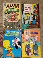 Front covers of four comics