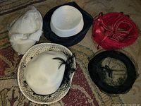 All five hats front view