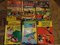 Front covers of the six comic books laid out for identification