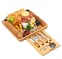 Marketing image showing assembled board with knives and accessories
