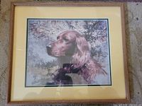 Front view showing framed dog print with matting and frame