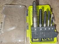 Open case displaying five extractors in holder