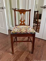 Full view of side chair showing frame and seat