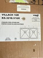 Manufacturer label on box showing model KS.3218.V16R, dimensions and schematic