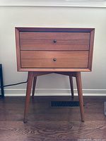 Front view of West Elm acorn finish nightstand showing overall design