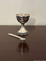 kiddush cup front view with spoon