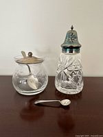 Jam pot, sugar caster, and spoons overview