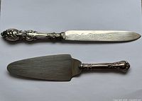 Full view of cake knife and pie server