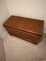 Closed cedar chest showing exterior finish and overall condition