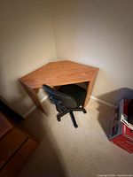 Corner desk with chair tucked underneath