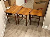 Front view of all three nesting tables side by side