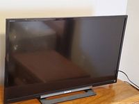 Front view of Sony Bravia 32-inch television on stand