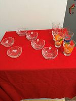 Group shot showing all juice glasses and apple-shaped bowls