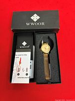 Watch, box, and instruction card overview