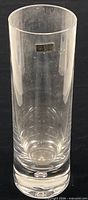 Full view of clear cylindrical crystal vase showing sticker and form