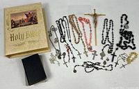 Entire lot: large Bible, small book, crucifix, rosaries, medals