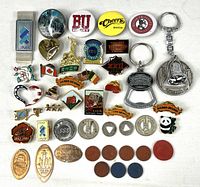 Overall view of all pins, keychains, tokens and ration points