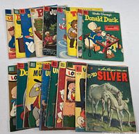 All 18 comic books laid out in two rows