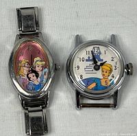 Front view of both Disney princess watch heads
