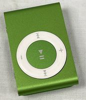 Front view showing control pad and green anodized finish