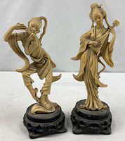 Both resin Chinese musician figurines on bases