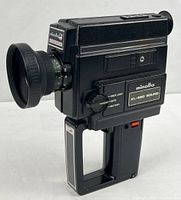 Full view of Minolta XL-660 camera showing lens, body and grip