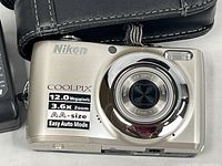 Front view of camera with carrying case