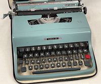 Front view Olivetti Lettera 32 typewriter showing keys and body