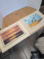 Both prints side by side showing size and imagery