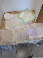 Overview of seven assorted handkerchiefs laid out