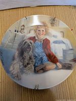 Close-up of Annie with Sandy plate