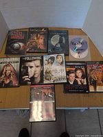 Group shot of all 10 DVDs laid out