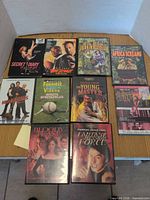 Group shot of nine visible DVD cases arranged 3×3