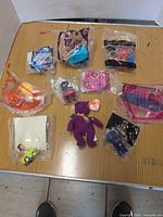 Group shot of all ten Happy Meal toys on table