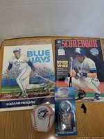 overview of magazines, change purse and packaged key ring