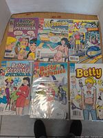 All six bagged Archie Comics issues laid out for overview
