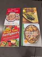 Group shot of all four cookbooks front covers